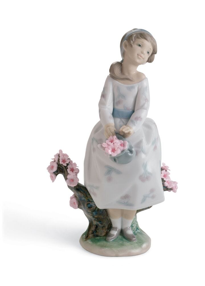 A Walk through Blossoms Girl Figurine in Lladró