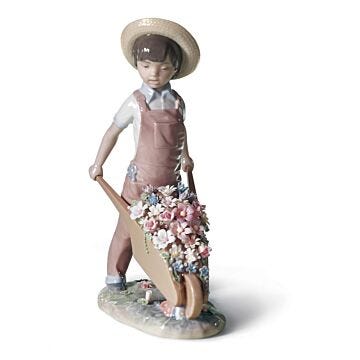 Figurina Bimbo con fiori in Lladró