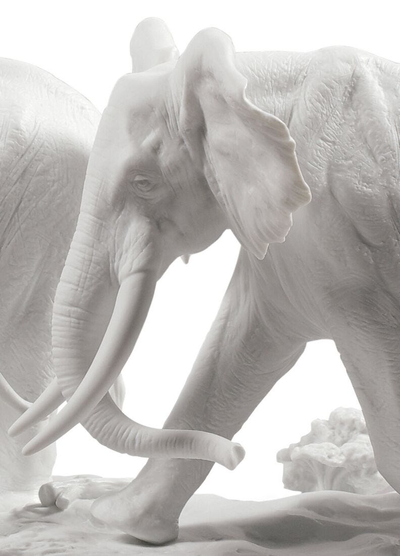 A Stop Along The Way Elephants Sculpture. White, 1 of 5