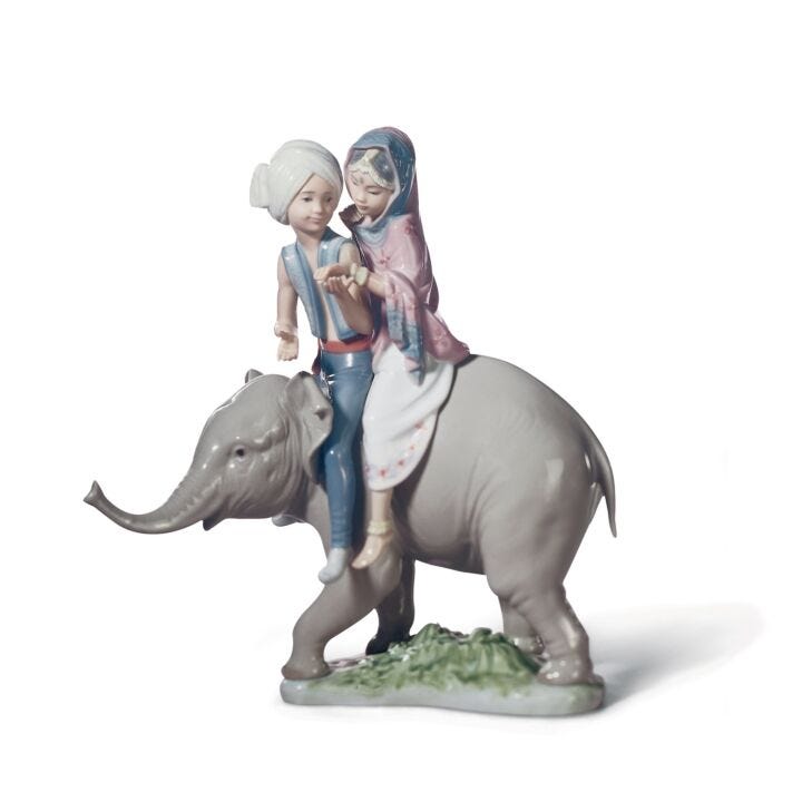 Figura Niños hindúes sobre elefante en Lladró